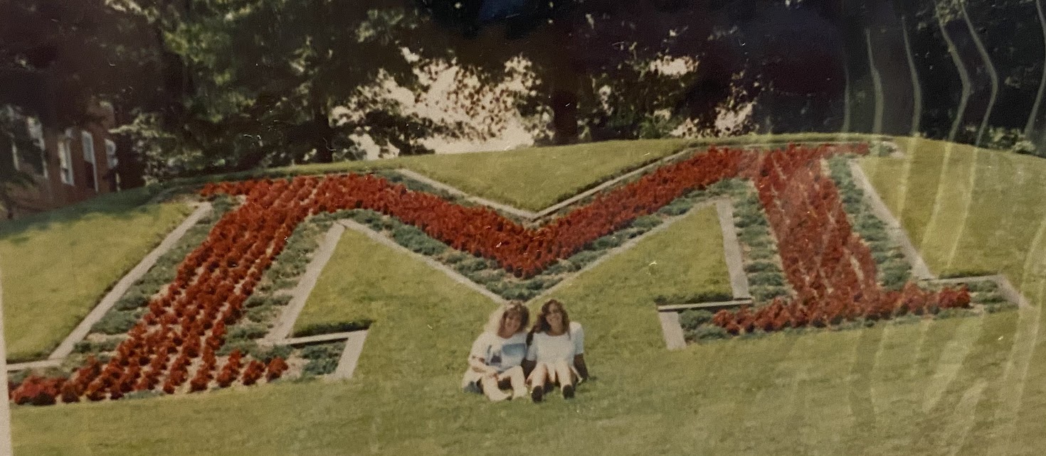 Two youung women in front of the UMD M in mid 90's fashion