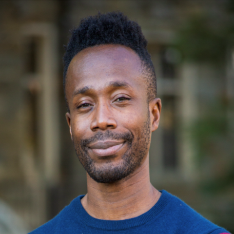 A centered headshot of Kwame Edwin Otu